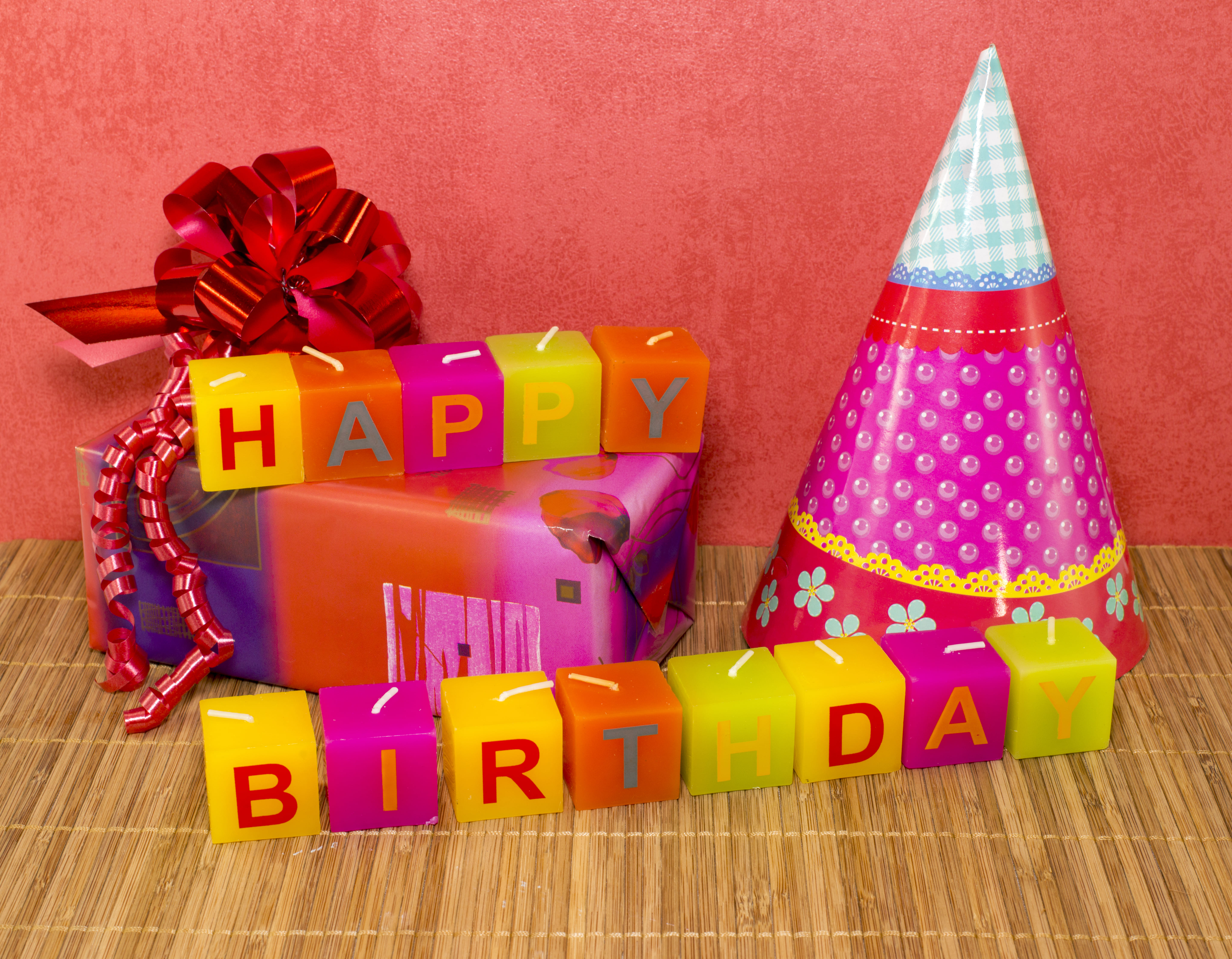 Happy birthday with gift and party hat